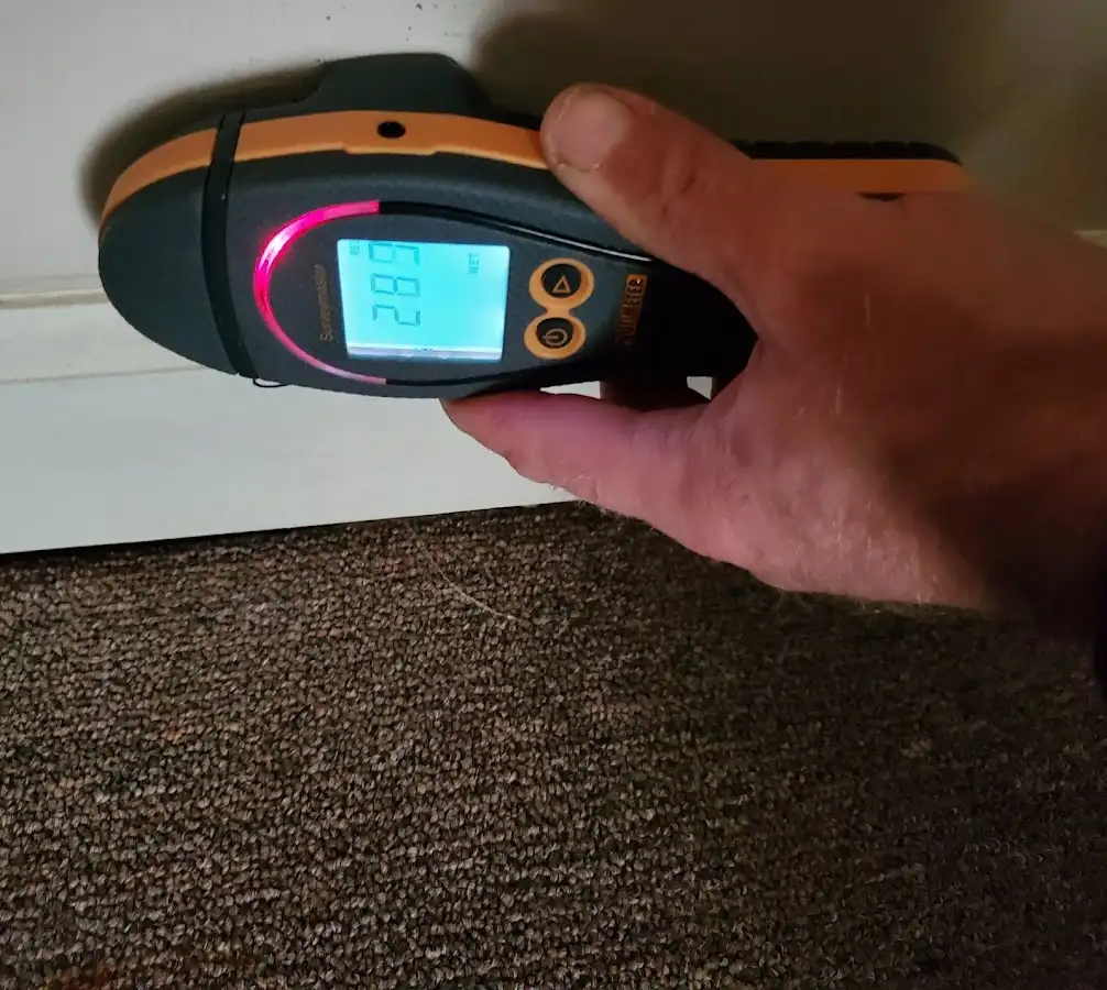 Moisture detection at baseboard during Sewage Cleanup & Sanitation in Owasso
